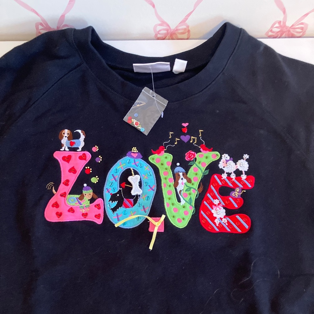 Adorable black love sweatshirt. Brand new with tags.